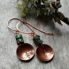 A small copper disc that I've hand stamped with a leafy branch design and then domed slightly dangles below 2 african turquoise nuggets. The copper discs have been given an antiqued finish. These measure just shy of 2 inches from the tops of the hand formed and forged ear wires. I have a version similar to these in sterling silver that can be found here: https://www.etsy.com/listing/788766284/southwestern-jewelry-turquoise-earrings?ref=shop_home_active_1 These will ship quickly~gift boxed pretti Stamped Metal Jewelry, Necklace Leather Cord, Turquoise Jewelry Set, Unique Dangle Earrings, Metal Stamped Jewelry, Bijoux Fil Aluminium, Jewerly Making, Stamped Metal, Necklace Leather