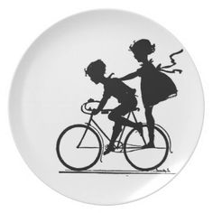 the silhouettes of two people riding on a bicycle