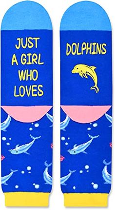 Dolphin SocksThese blue socks feature vibrant prints of lively dolphins, bubbles and shells, making them a stylish addition to any outfit. The socks have a funny saying "JUST A GIRL WHO LOVES DOLPHINS" .Size & PackageOne size fits most. Our women's crazy socks are designed to fit shoe sizes 6-12 and sock sizes 8-13. Each pair of funny socks comes in a plastic zippered bag.Quality MaterialOur cute animal socks are made of 80% Cotton, 15% Polyamide, and 5% Elastane to ensure that they are soft, co Funny Blue Socks For Gift, Shark Socks, Marine Gifts, Dolphin Gifts, Animal Socks, Gifts For Moms, Zippered Bag, Blue Socks, Sock Animals