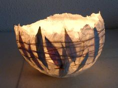 a white bowl sitting on top of a table