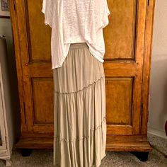 Size Small Color Olive Long Tiered Skirt. Elastic Waistband. Lightweight. Made In Italy Casual Flowy Tiered Maxi Skirt, Casual Lined Maxi Skirt For Vacation, Casual Flowy Maxi Skirt For Vacation, Flowy Casual Maxi Skirt For Vacation, Casual Long Ruffled Maxi Skirt, Casual Flowy Maxi Skirt, Casual Vacation Flowy Skirt, Casual Relaxed Tiered Maxi Skirt, Casual Tiered Maxi Skirt For Vacation