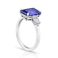 4.14 carat Emerald Purple Sapphire with Tapered Baguette Diamonds 0.56 carats set in a platinum ring Platinum Baguette Cut Gemstone Ring, Platinum Rings With Baguette Cut Gemstone, Baguette Cut Platinum Gemstone Rings, Luxury Platinum Baguette Cut Sapphire Ring, White Gold Baguette-cut Sapphire Ring In Platinum, Baguette Cut Sapphire Ring In Platinum, Classic White Gold Sapphire Ring With Baguette Diamonds, 14k White Gold Rings With Baguette Cut, Platinum Sapphire Ring With Baguette Cut And Prong Setting