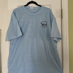 Men’s 2xl Heavy Cotton Short Sleeve T-Shirt With Shark Print On The Front And Larger One In The Back.Never Worn.Excellent Shape.Great For The Beach Or Just Hanging Out.Made By Gildan.Color Light Blue. Light Blue Short Sleeve Pre-shrunk Shirt, Light Blue Pre-shrunk Short Sleeve Shirt, Casual Light Blue Pre-shrunk Shirt, Shark Print, Color Light Blue, Cotton Shorts, Color Light, Hanging Out, Cotton T Shirt