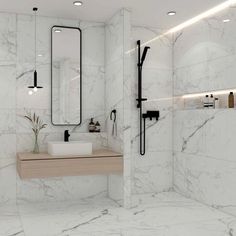 a bathroom with marble walls and flooring