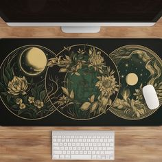 a computer keyboard sitting on top of a wooden desk next to a mouse and monitor