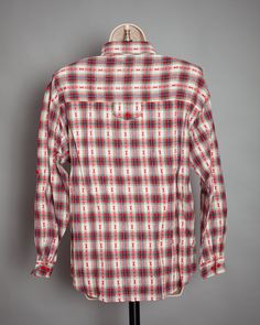 Vintage 80s 90s top. Plaid with some country western style designs. Shoulder padded. CABIN CREEK size - M vintage pre-owned Vintage Cotton Tops For Rodeo, Plaid Long Sleeve Tops For Ranch, Long Sleeve Plaid Top For Ranch, Spring Americana Long Sleeve Tops, Vintage Relaxed Fit Tops For Rodeo, Fitted Plaid Western Tops, Western Plaid Tops For Ranch, Casual Plaid Tops For Rodeo, Fitted Western Plaid Tops