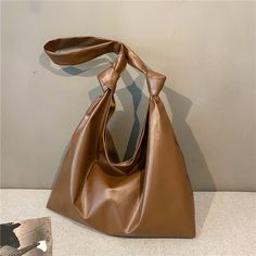 Brand: IELGY Size:41*34.5*32*10cm  Bag size: large. Material texture: polyester. Pattern: solid color. Colors: white, khaki, black, brown. Processing method: embossing. Lifting parts: soft handles. Bag style: tote bag. Type of outer bag: none. Hardness: soft Material: PU Bag shape: horizontal square. Opening mode: magnetic buckle. Popular elements: folds. Style: fresh and sweet. Number of shoulder straps: single. With or without interlayer: none. Upper width: 41cm, lower width: 34.5cm, height: 32cm, thickness: 10cm Pu Bag, Material Textures, Bag Style, Womens Tote, Soft Material, Shoulder Straps, Fashion Bags, Bali, Bag Lady