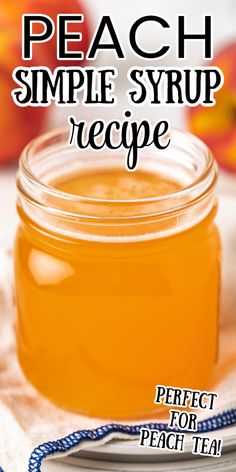 Close up view of a jar of peach syrup. Homemade Peach Syrup, How To Make Flavored Simple Syrups, Fruit Syrup For Drinks, Peach Simple Syrup Recipes, Peach Scrap Syrup, Peach Syrup Cocktail, Peach Puree For Drinks, Peach Syrup For Tea, Flavored Syrups For Drinks