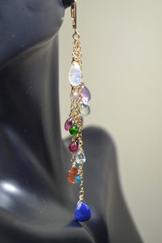 "These Earrings are a beautiful composition of Stunning Gemstones that are presented to You in a \"Rainbow\" of Colors: It will bring a smile to your recipient's face and it sure to go with any outfit! Each Earring features 14 Unique Gemstones in a variety of shapes and sizes. This gives the earrings lots of character and each gemstone is individually hand wired for a more bohemian look and feel. >Rainbow, Rainbow Statement Earrings, Chain Drop Earrings, Gemstone Earrings, Duster Earrings, Lo Party Jewelry With Gemstones In 14k Gold, Party Jewelry In 14k Gold With Gemstones, 14k Gold Gemstone Jewelry For Parties, Party 14k Gold Gemstone Jewelry, Gold Multi-stone Chandelier Earrings As Gift, Gold Multi-stone Chandelier Earrings For Gift, Teardrop Multi-stone Yellow Gold Jewelry, 14k Gold Gemstone Dangle Jewelry, Teardrop Yellow Gold Multi-stone Jewelry