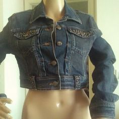 This Is A Hot Cropped Jean Jacket. Love The Studs, Great Lines And Threading. Pockets In Front And Studded Up. Always Love The Cropped Jean Jackets, They Are Sexy. Ptp 17 No No No Stretch Fitted Denim Cropped Jacket With Buttons, Fitted Medium Wash Cropped Jacket With Pockets, Fitted Cropped Jacket With Pockets In Medium Wash, Fitted Dark Wash Cropped Jacket With Long Sleeves, Fitted Long Sleeve Dark Wash Cropped Jacket, Trendy Fitted Dark Wash Outerwear, Fitted Cropped Denim Jacket For Winter, Fitted Cropped Vintage Denim Jacket, Vintage Fitted Cropped Denim Jacket