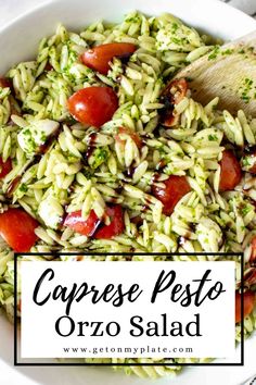 caprese pesto orzo salad in a white bowl