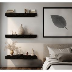 two floating shelves above a bed in a bedroom