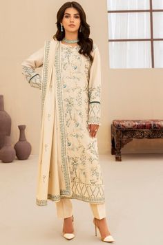 Mohagni MWS-07 Woolen Winter Collection Cotton Salwar Kameez In Off White With Printed Motifs, Off White Cotton Salwar Kameez With Printed Motifs, Cream Sets With Printed Motifs For Festivals, Beige Long Sleeve Cotton Lawn Suit, Cream Festival Sets With Printed Motifs, Winter Lawn Suit With Printed Motifs, Cream Cotton Salwar Kameez For Spring, Embroidered Cream Cotton Lawn Suit, Spring Cream Cotton Salwar Kameez