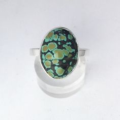 "This ring features a natural turquoise carved scarab bezel set in sterling silver. The carved scarab turquoise stones are vintage from the 1960's and vary in color and pattern but all are gorgeous. The carving is on the top and the underside of the scarab. The bezel has an open back so you can also see the carving on the underside. Each turquoise scarab is 16x12mm (.62\" inch). In ancient Egypt the scarab was a symbol of transformation and protection. If you would like this ring in a size not o Unique Turquoise Oval Rings, Green Turquoise Ring For Jewelry Making, Green Turquoise Ring With Natural Stones, Unique Turquoise Chrysocolla Ring, Oval Turquoise Inlay Rings, Oval Turquoise Rings With Inlay, Artisan Oval Green Emerald Ring, Artisan Oval Emerald Ring, Unique Green Cabochon Turquoise Ring