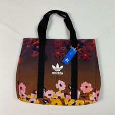 This listing includes a nice New ADIDAS ORIGINALS Her studio london tote Bag floral TREFOIL SHOPPER GD1853 Brand new with tags. The object in the pictures is the actual item you'll be receiving.  Size on label:  Expect great customer service and super fast shipping from Central Florida.  We ship everyday!  Thanks for looking! Adidas Sports Bag In Pink, Casual Adidas Nylon Bags, Multicolor Nylon Bags For Spring, Sporty Multicolor Bag With Adjustable Strap, Functional Multicolor Summer Bags, Mens Short Swim Trunks, London Theme, Shoulder Bag Black, Central Florida