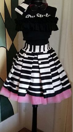 Short Pleated Black And White Stripes Skirt With Tulle Chic Petticoat Skirt For Party, Spring Black Full Skirt Petticoat, Black Full Skirt Petticoat For Spring, Party Flared Petticoat With Lined Skirt, Chic Skirt-style Petticoat For Parties, Chic Party Petticoat Skirt, Fitted Pleated Petticoat For Party, Spring Black Lined Petticoat, Chic Party Petticoat