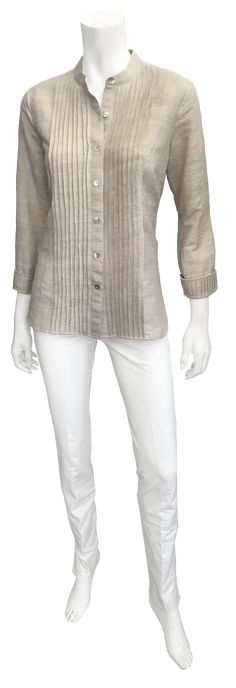 This casual style has been rendered in very elegant fabric and with sophisticated details, making an easy to wear yet formal top. Three quarter length sleeves Pintucked front Pintucked sleeve cuffs Small mandarin collar Button front Runs true to size Material: 100% Silk Care: Dry clean only Formal Top, Formal Tops, Elegant Fabric, British Indian, Raw Silk, Mandarin Collar, Sales Gifts, Three Quarter, Casual Style