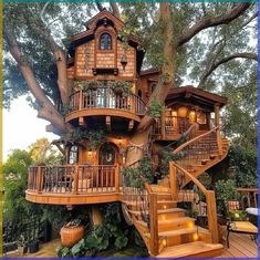 a tree house with stairs leading up to it