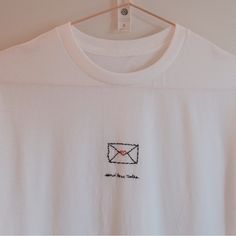 I Made This By Hand! In The Style Of A Fine Line Tattoo. Done On A Brand New Gildan Size M Unisex Tee. I Am Developing My Style While Trying To Keep Things Whimsical! Everyday White Tops With Letter Embroidery, White Tops With Embroidered Text For Everyday, White Everyday Top With Embroidered Text, Cute White T-shirt With Letter Embroidery, Cute White Tops With Letter Embroidery, Send Love, Fine Line Tattoo, Line Tattoo, Fine Line Tattoos