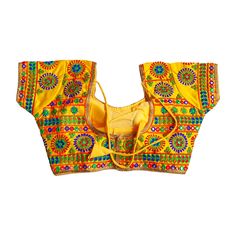 This Multi color Kutchi work readymade Blouse is the perfect addition to your festive wardrobe! With beautiful embroidery in multiple colors, it will add a touch of glamor to any saree. The yellow base is perfect for pairing with chaniya cholis during navratri. So don't wait, order yours today! Navratri Multicolor Embroidered Chanderi Blouse, Bollywood Style Yellow Tops For Festivals, Yellow Resham Embroidery Blouse For Navratri, Yellow Zari Work Top For Navratri, Yellow Blouse With Resham Embroidery For Navratri, Yellow Blouse With Zari Work For Navratri, Navratri Yellow Blouse With Resham Embroidery, Unstitched Yellow Blouse Piece For Diwali, Yellow Tops With Resham Embroidery For Diwali