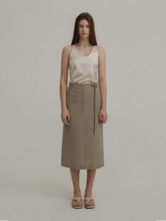 This is a trendy and minimal skirt by AVA MOLLI that is made out of high quality and sturdy material. With distinctive mood of the design and feminine look, you can style it for your trendy and casual daily outfit.- H line silhouette- Belt included with double belt loop- Set up with matching jacket Beige Relaxed Fit Pencil Skirt For Summer, Beige Summer Skirt For Office, Beige Office Skirt For Summer, Beige Summer Office Skirt, Neutral Skirt For Spring Workwear, Modern Long Pencil Skirt For Spring, Beige Pencil Skirt For Summer Office Wear, Summer Office Beige Pencil Skirt, Elegant Linen Pencil Skirt