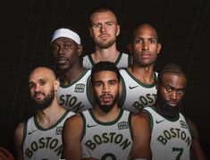 the boston basketball team is posing for a photo in their green and white uniforms with beards