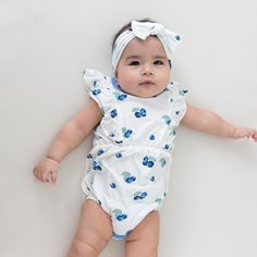 Our hearts are aflutter for this classic bubble romper that’s as cute as can be. Flutter sleeve details add the sweetest touch, while the bubble silhouette creates an adorable all-in-one outfit. Crafted from soft, stretchy bamboo, this lightweight romper keeps little ones cool and comfortable throughout the warmer months. 97% Bamboo Rayon, 3% Spandex Flutter sleeves Inseam snap closures Single snap closure at the back Bubble silhouette Bubble Silhouette, The Bubble, Bubble Romper, Baby Grows, Flutter Sleeves, Fun Prints, Sleeve Detail, Flutter Sleeve