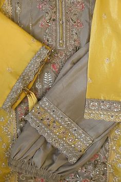 Discover elegance with our Tan Chinon Silk Embroidered Palazzo Style Suit. Perfect for weddings, parties, or any festive occasion. Featuring intricate embroidery, mirror work, zari, sequins, and a matching embroidered chinon silk palazzo & embroidered chinon silk dupatta. 3 piece Chinon Silk Work: heavy embroidery, mirror work, zari work & sequin work Dupatta chinon silk with embroidery, zari work, sequin work Style: Straight cut Side slit Santoon lining Kameez Length: 42" Palazzo Length: 40" Sl Phulkari Pants, Embroidery Mirror Work, Lucknowi Kurta, Patiala Salwar Suits, Embroidery Mirror, Bridal Dupatta, Palazzo Style, Phulkari Dupatta, Chikankari Suits