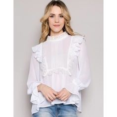 This Romantic Blouse Is The Perfect Choice For Adding A Little Elegance To Your Outfits! Featuring A Soft Fabric Paired With Gorgeous Ruffles And Delicate Lace Accents, Pleated Details, And High Low Hem, It's Simply Darling! Color: White / Ivory Material: 100% Polyester Hand Washes Cold. Measurements: Size S: Bust Armpit To Armpit 19”. Length (High -Low) 23” To 25” Size M: Bust Armpit To Armpit 20”. Length (High -Low) 24” To 26” Size L: Bust Armpit To Armpit 22”. Length (High -Low) 25” To 27”. Elegant White Top With Ruffle Hem, Elegant White Tops With Ruffle Hem, Feminine Ruffled Collar Blouse For Brunch, Feminine Lace Top Blouse, Feminine Ruffled Blouse For Brunch, Elegant White Ruffled Tops, Elegant Tops With Ruffle Hem For Daywear, Feminine White Blouse With Ruffles, Feminine Ruffled Blouse For Daywear