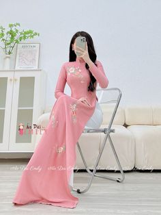 🌻Material: Lụa vân gỗ 🌻Stretchy level: 2/10 🌻 The measurement of this ao dai (long dress) is in Vietnamese size (American size tends to be bigger for the same size). Please LOOK AT THE SIZE CHART CAREFULLY BEFORE ORDERING. There might have some chalk writings on the fabric due to making process. These marks can be washed away easily. 🌻🌻No returns or exchanges Buyer can contact seller about any issues with an order. 🌸 Follow us Facebook/aodaiemily www.aodaiemily.com 💜 Thank you very much💜 Pink Long Sleeve Cheongsam For Spring, Spring Long Sleeve Pink Cheongsam, Spring Pink Long Sleeve Cheongsam, Traditional Fitted Pink Ao Dai, Embroidered Long Sleeve Cheongsam For Spring, Traditional Pink Ao Dai For Spring, Spring Embroidered Long Sleeve Cheongsam, Spring Embroidered Full Length Dress, Fitted Long Sleeve Cheongsam With Floral Embroidery