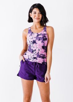 Maya Swim Top Fit & Sizing Tight Fit Top Length 66.5cm (Size S) If you are between sizes, or in doubt, please size up. Features Tankini Round Neckline Built-in Bra for shaping and support Side ruching creates a flattering cinched look UPF 50+ Sun Protection Swimwear Racerback for chic, modern detail Quick Dry Care Rinse in cold water to wash off any chemicals, chlorinated water or saltwater Machine wash in cold water on gentle cycle Lay flat to dry in the shade Material Sporty Tankini With Built-in Shorts, Sporty Stretch Tankini With Built-in Shorts, Sporty Fitted Tankini With Built-in Shorts, Stretch Moisture-wicking Tankini, Fitted Racerback Activewear With Built-in Shorts, Pink Short Length Top For Sports, Workout Stretch Tankini With Built-in Shorts, Fitted Purple Sports Shorts, Purple Fitted Sports Shorts