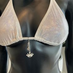 Make A Splash At The Beach Or Pool With Our Charming Bikinis Crown Charm. This Elegant Bikini Top Features A Regal Crown Charm For A Touch Of Royal Flair. Charming Bikini Charms Are The Newest-Hottest Item Out! They Are Removable Charms So You Can Use Them On Other Bikinis. Patent Pending Silver Triangle Top Swimwear For Beach, Silver Triangle Top Swimwear For Beach Season, Silver Triangle Top Swimwear For Summer, Silver Swimwear For Summer Beach, Silver Beach Swimwear For Summer, Silver Swimwear For Beach In Summer, Party Swimwear With Adjustable, Bra-friendly Fit, Silver Festival Swimwear For Summer, Cupshe Bikinis