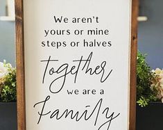 a sign that says we aren't yours or mine steps or halves together are a family