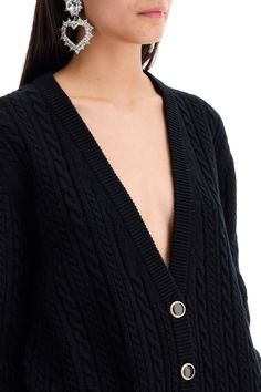 Imagine wrapping yourself in a cozy hug on a chilly day—that's what this piece feels like. It's perfect for lounging in style or adding a touch of effortless elegance to your outfit. Who knew comfort could look this chic? Made of cable knit wool for ultimate warmth and comfort Features a deep V-neckline and ribbed edges for a classic look Comes with button closure and slit pockets for practicality Oversized fit for a relaxed and cozy feel Tie Scarf, Rich Women, Alessandra Rich, Knitwear Cardigan, Sweater Design, Wool Cardigan, Black Cardigan, Flip Flop, Classic Looks