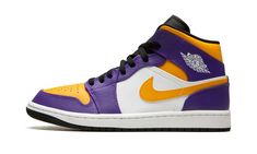 a pair of purple and yellow sneakers