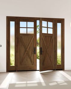 two wooden doors open in an empty room