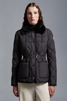 Designed for sophisticated women with a timeless style, the Cygne down jacket is easily layered over workwear and weekend leisure looks. Crafted from recycled polyester, the short puffer boasts geometric quilting and a nipped-in, belted silhouette. The lightweight style is finished with a detachable faux fur collar. Classic Fall Puffer Jacket With Padded Collar, Luxury Long-sleeve Quilted Outerwear, Luxury Quilted Long Sleeve Outerwear, Luxury Long Sleeve Outerwear With Faux Fur Trim, Luxury Long Sleeve Quilted Jacket For Fall, Designer Long Sleeve Outerwear With Faux Fur Trim, Designer Quilted Winter Outerwear, Luxury Long Sleeve Quilted Jacket For Winter, Luxury Winter Outerwear With Padded Collar