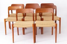 six danish teak dining chairs with woven seats