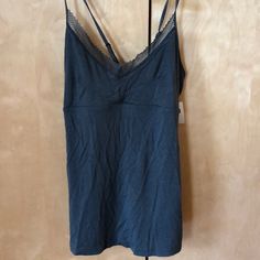 Gap Body Camisole With Adjustable Straps That Cross Cross In The Back. Soft Modal Fabric. Beautiful Dark Teal Shade. A Bit Of Lace. Great For Layering. See Photo. Brand New With Tags. Size Medium. Camisole With Built-in Bra For Loungewear, Cotton V-neck Tank Top With Built-in Bra, Casual Camisole With Built-in Bra For Relaxation, Casual Camisole With Built-in Bra For Daywear, Spring Camisole With Built-in Bra For Relaxation, Blue V-neck Camisole With Adjustable Straps, Blue V-neck Tank Top With Built-in Bra, Casual Cami Sleepwear With Built-in Bra, Casual Sleep Tops With Built-in Bra