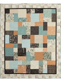 a patchwork quilt with many different colors