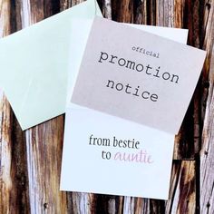 two pieces of paper sitting on top of each other next to an envelope with the words promotion notice written on it