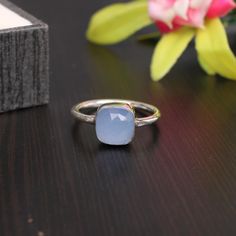 Dainty Blue Chalcedony Silver Ring - Stacking Rings - Sterling Silver Ring - Gemstone Rings - Blue Rings -Chalcedony Jewelry - Gift for Her 》D E T A I L S《 ✦Gemstone : Blue Chalcedony ✦Metal : 925 Sterling Silver ✦Gemstone Size : 8 x 8 MM Approx ✦Weight : 3 Gram Approx ❣❣ Handmade Item ❣❣ **This ring is Made to Order** 》G EM S T O N E D E T A I L《 **Gemstone structure may vary from the image as two gemstones do not have the same structure** If you want to see the picture of gemstone, then feel f Light Blue Ring For Anniversary, Light Blue Sterling Silver Rings As Gifts, Blue Stackable Jewelry As Gift, Blue Moonstone Stackable Ring, Stackable Blue Rings For Gifts, Light Blue Birthstone Ring, Adjustable Chalcedony Jewelry For Anniversary, Blue Minimalist Moonstone Promise Ring, Blue Round Stackable Moonstone Ring