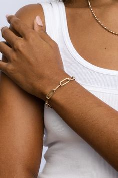 Classy and chic. The Erin Bracelet creates a bit of dazzle on your wrist, whether worn alone or stacked with your other favorites. This link bracelet is an arm party must have! STYLING TIP: Pair with the best selling Fashion Jackson Bracelet for the perfect everyday stack. Gold-filled or sterling silver 7mm chain width Available in 4 lengths 5.5" plus 1.5" extender 6.5" plus 1.5" extender 7.5" plus 1.5" extender 8.5" plus 1.5" extender If you are in between sizes we suggest sizing up to get a fu Modern Stackable Cuff Bracelet, Chic Everyday Gold Bracelet, Chic Gold Bangle Bracelet For Everyday, Chic Everyday Gold Bangle Bracelet, Adjustable Chain Bangle Charm Bracelet, Everyday Metal Bracelets With Extender, Trendy Chain Bracelet With Extender, Trendy Everyday Chain Bracelets, Modern Chain Link Gold Bracelet