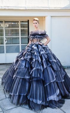 #KellysPalace is a voluminous skirt with draped panels of cascading pleated tulle ruffles in shades of black and pink paired with a sheer black tulle corset with a gathered pleated feature adjourning the shoulders from the Galia Lahav 'And God Created Woman' haute couture fall 2018 collection. Tulle Corset, Glamorous Evening Dresses, Tulle Ruffles, God Created Woman, Pleated Tulle, And God Created Woman, Voluminous Skirt, Galia Lahav, Black Tulle