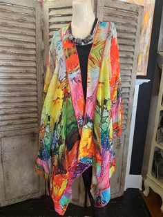 Ink Alcohol Short Butterfly Jacket One Size Fits Most 100% Rayon Dry Clean Only/Hand wash on delicate Made in India Avail: Pink multi MeasurementsLength HPS: (total length from high pt of shoulder to hem) – 28″Chest Circumference: (1″ below armhole) – 40″Sleeve Length: (from center back neck to sleeve hem) – 26″Sleeve Opening: (circ.@ sleeve hem) – 21 1/2″Sweep: (circumference on bottom hem) – 44″Shoulder: (shoulder pt seam to shoulder pt seam across back) – 17 1/2″Armhole Drop – 9 1/2″Neck Widt Long Multicolor Print Kimono For Spring, Multicolor Open Front Kimono For Spring, Spring Multicolor Open Front Kimono, Casual Multicolor Wrap Kimono, Multicolor Wrap Outerwear For Spring, Multicolor Wrap Kimono For Spring, Multicolor Wrap Kimono For Fall, Multicolor Wrap Spring Outerwear, Spring Multicolor Wrap Outerwear