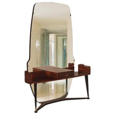 an art deco desk and mirror in the shape of a house