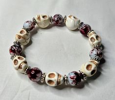 This bracelet is adjustable and stretchy for maximum comfort. Halloween Skull Bracelets With Skull Print, Halloween Punk Skull Bracelets, Skull Bead Bracelet, Casual Adjustable Skull Beaded Bracelets, Handmade Casual Skull Bracelets, Red Skull, Skull Bracelet, Art Market, Halloween Art