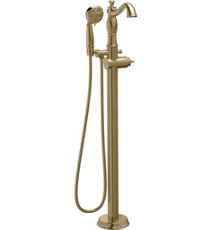 an antique brass finish shower faucet with hand shower head and handshow spout