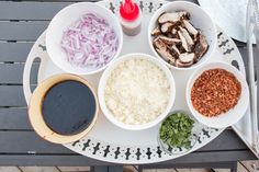 the meal is prepared and ready to be eaten on the patio table for two people