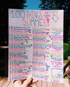 someone holding up a poster that says 100 things to do in summer on the deck